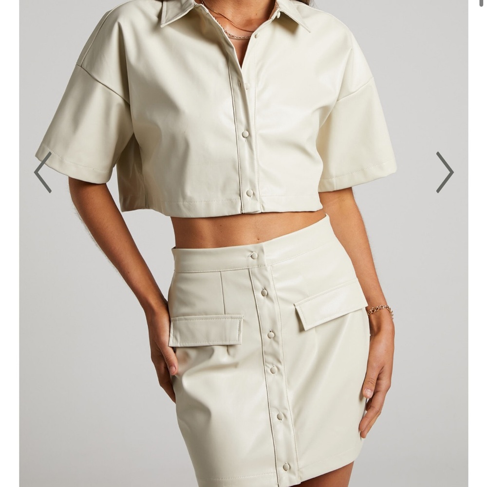 FERRAH TWO PIECE SET - FAUX LEATHER BUTTON FRONT CROP TOP AND MINI SKIRT IN ECRU
